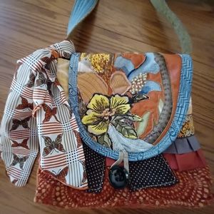 Beautiful hand made bag. Straps are 43 inches. Brand bags for healing.